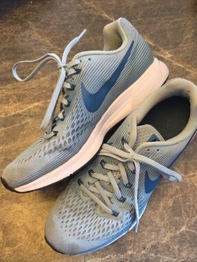 Nike Light Blue Running Sneakers with Navy Swoosh